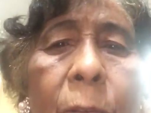 Grandmother recording a video message