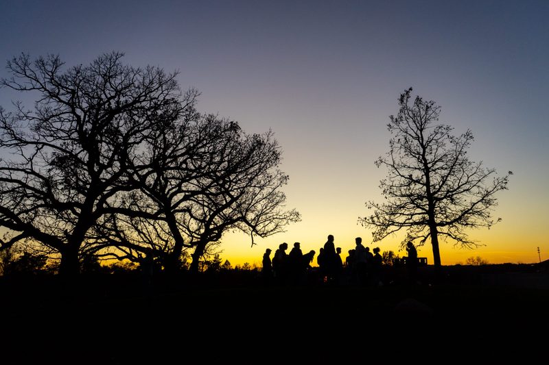 The Class of 2023 gathers for a bonfire on the Hill of Three Oaks on Friday, Oct. 25, 2019.