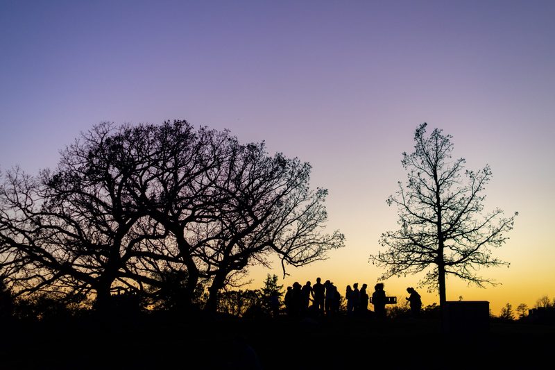 The Class of 2023 gathers for a bonfire on the Hill of Three Oaks on Friday, Oct. 25, 2019.