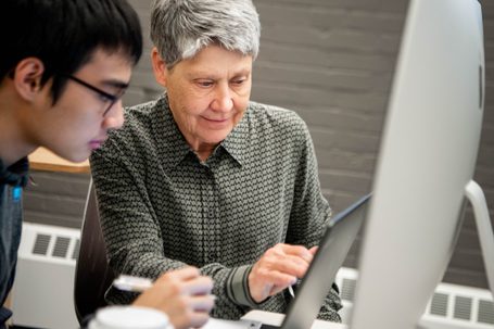 Professor Barbara Allen working with student