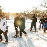 Students snowshoe in the arb