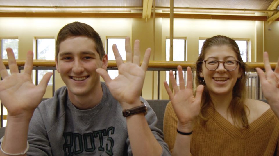 Students thank employees for their service to Carleton, counting up their years of employment!