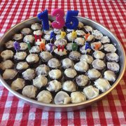 Image of mini cupcakes celebrating Dacie Moses' 135th birthday.