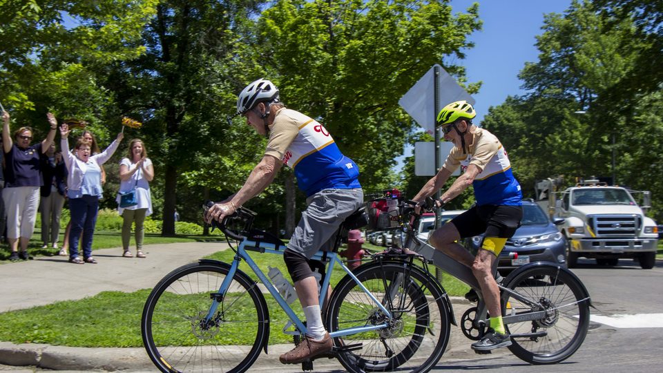 "Memory Riders" Bill Solberg and Lee Jones, Class of 1958, arrive on campus.
