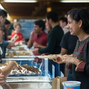 Students sample food from around the world at the 2019 International Festival.