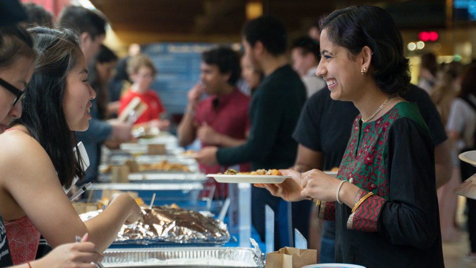 Students sample food from around the world at the 2019 International Festival.