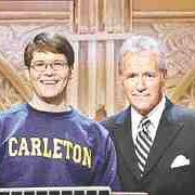 Lee Tucker '06 with Jeopardy host Alex Trebek