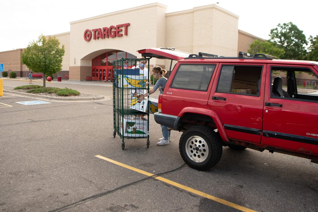 Izzy Link ’21 transporting food from Target for Carleton's Food Recovery Network