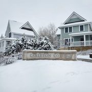 carleton sign in the snow outside the townhomes