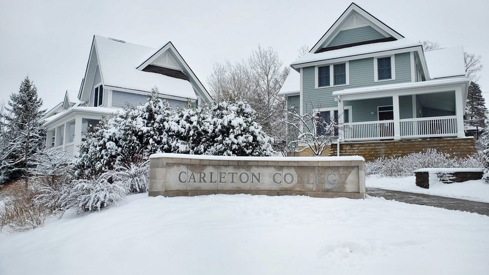 carleton sign in the snow outside the townhomes