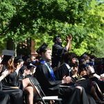 applauding the student speaker