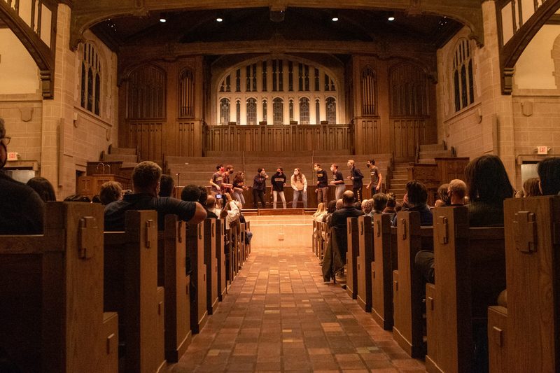 A look down the center idle of Skinner Chapel at the a cappella showcase.