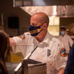Director of Security serving at Late Night Breakfast.