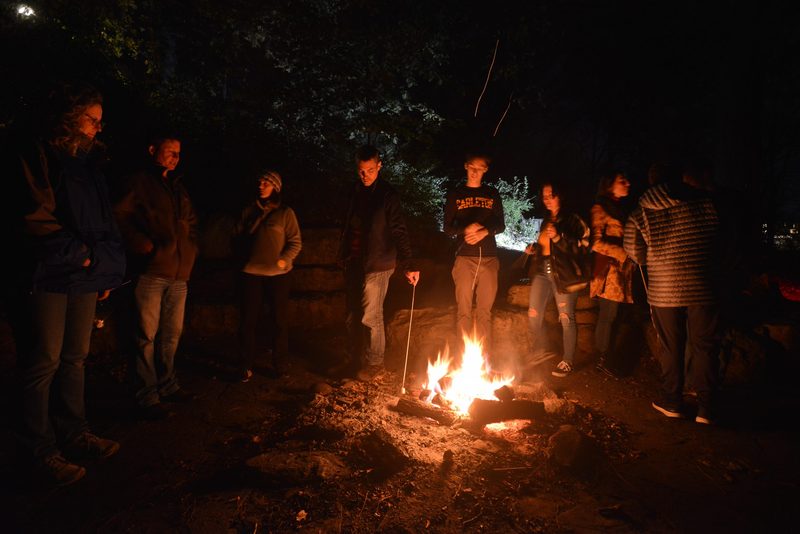 students around the bonfire