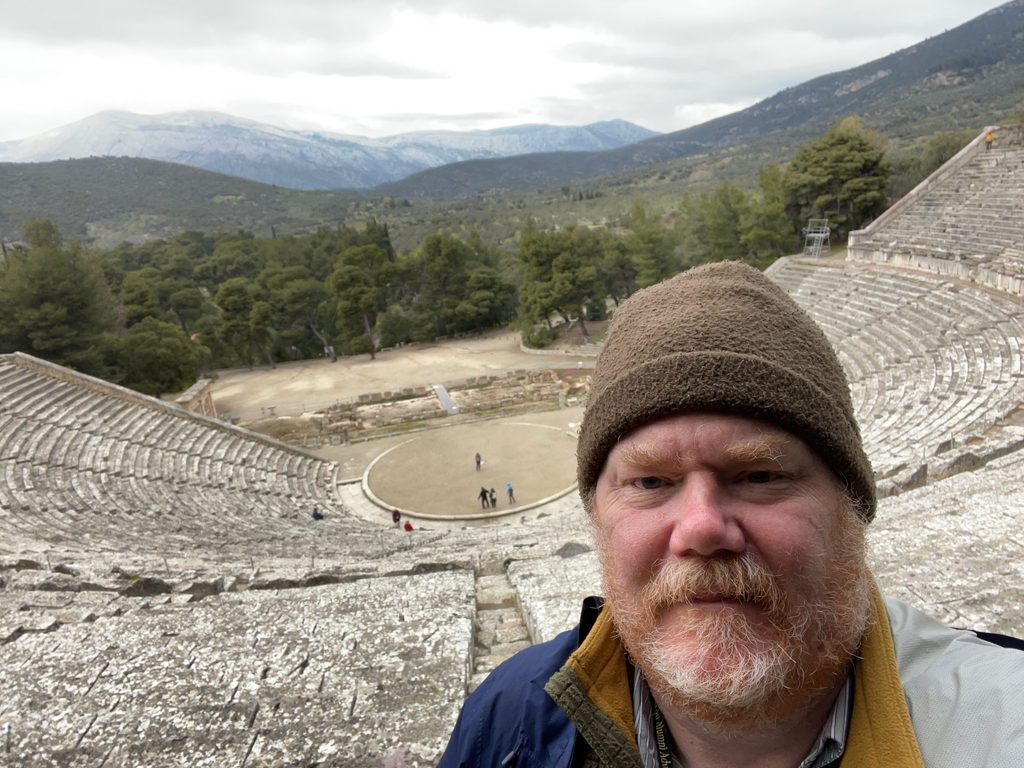Wide shot of Professor Rob Hardy in Epidavros, Greece