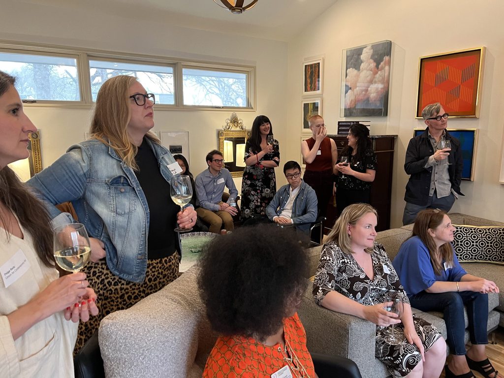 Candid group shot of current and future Weitz Fellows and Nebraska nonprofit leaders in Jack Becker's home