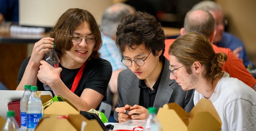 Aidan Lee-Gilligan ’24, Batmend Batsaikhan ’24 and Zimri Leisher ’23 take a break at the ICPC