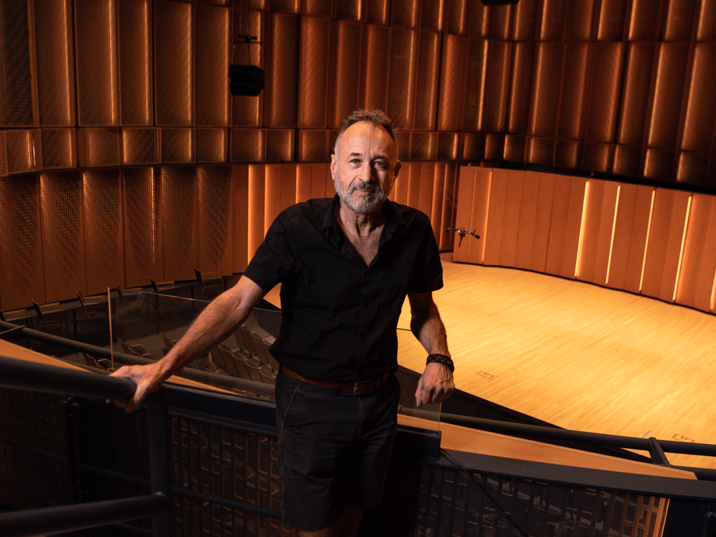 Matthew Zimmerman in the balcony of Kracum Hall