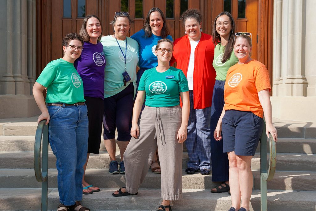 All pro staff members of the CCCE on the steps of the Chapel.