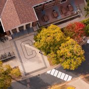 Aerial shot of the brick area in front of Sayles-Hill, where the bricks spell out a C.