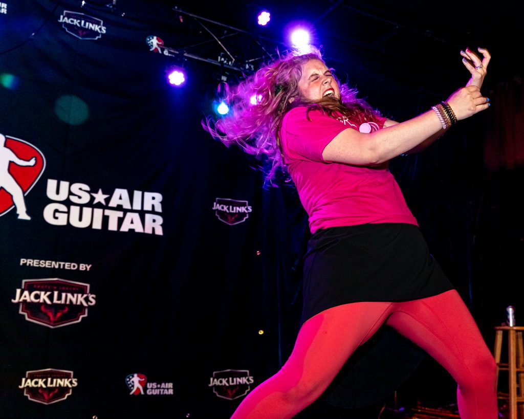 Rachel Sinclair '07 competes onstage at the U.S. Air Guitar National Championships.