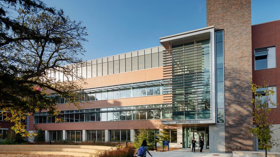 Wideshot of Anderson Hall with the sun shining on it.