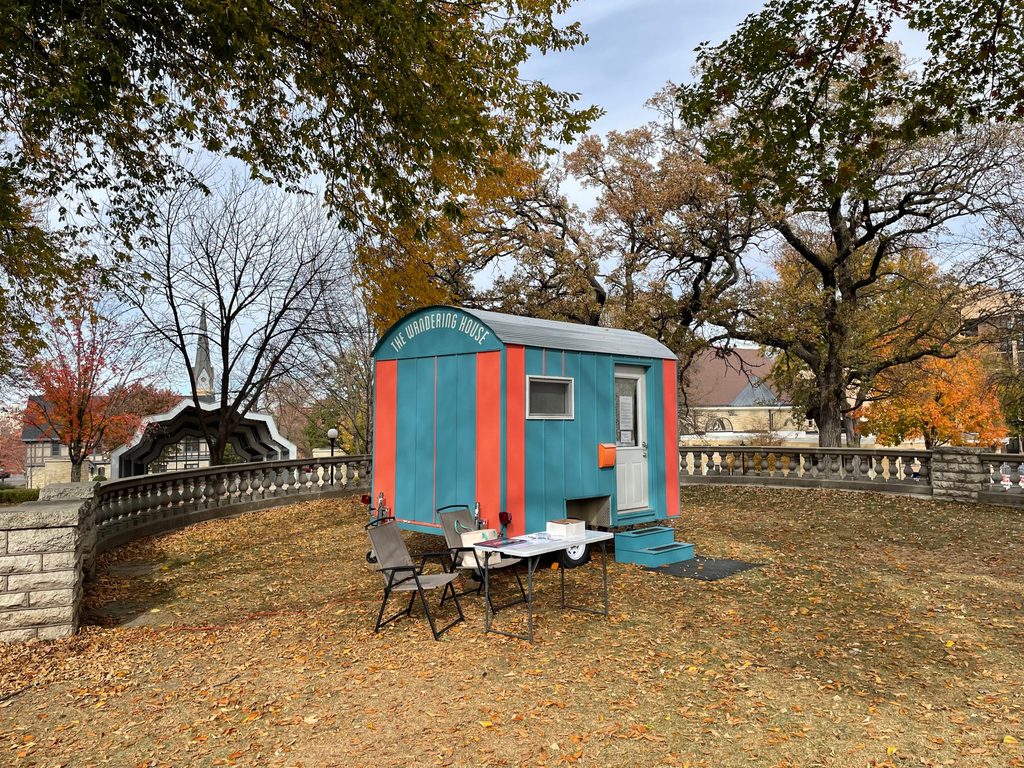 The Wandering House in a park full of fall colors in Red Wing.
