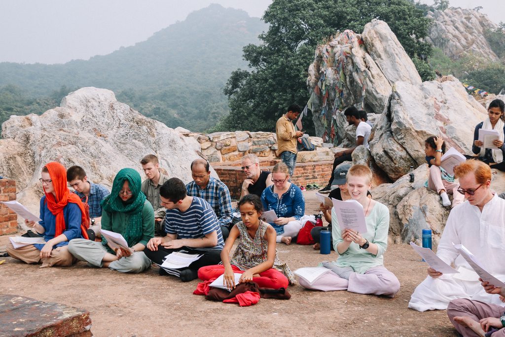 Students studying on a mountain top