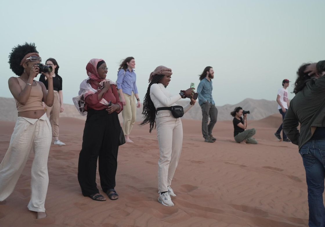 Students on Sand Dunes Africa & Arabia Sp22