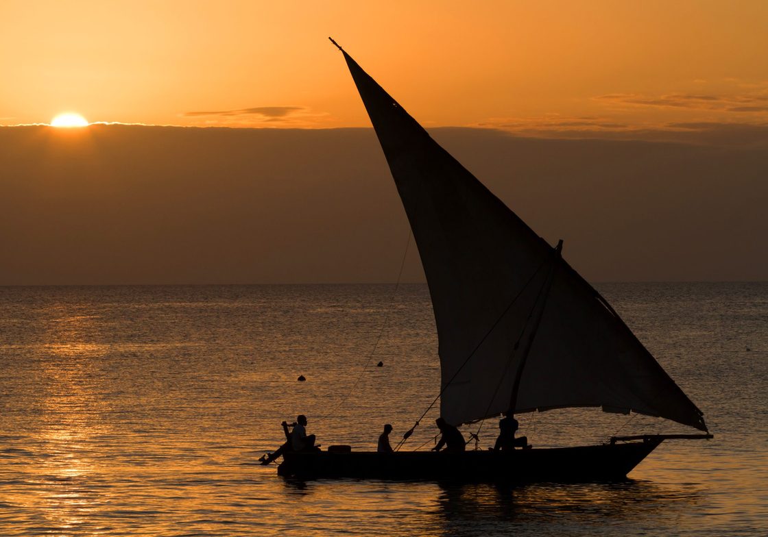 Ocean Sunset and Boat Silhouette in Zanzibar
