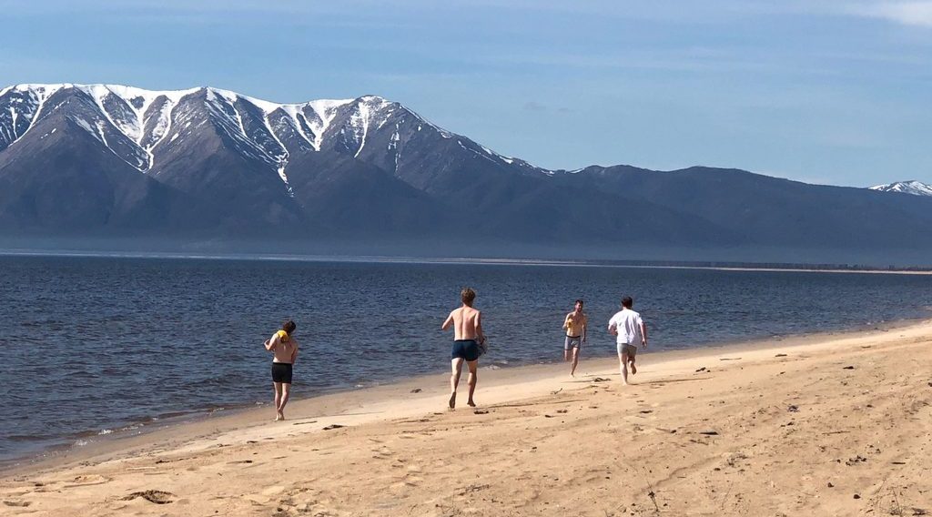 Students on the beach of Lake Baikal