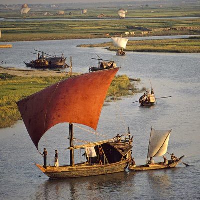 Sailboats and Canoes in Rural Bangladesh River