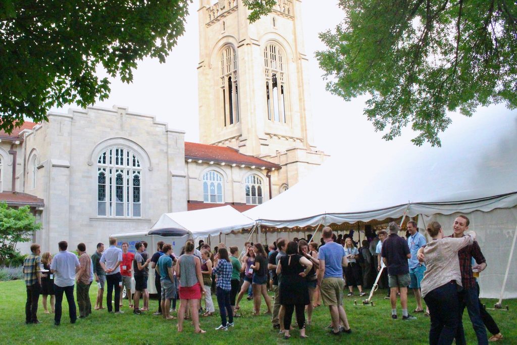Social gathering at large tent