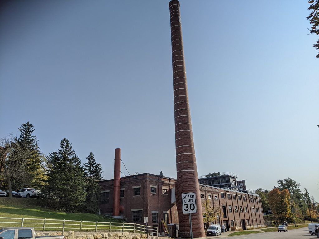 2020 photo of the physical plant showing the current stack and the smaller one replacing it