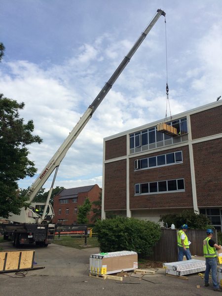 Lifting new equipment into Myers Hall