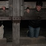 Students Posing in a Wooden Guillotine