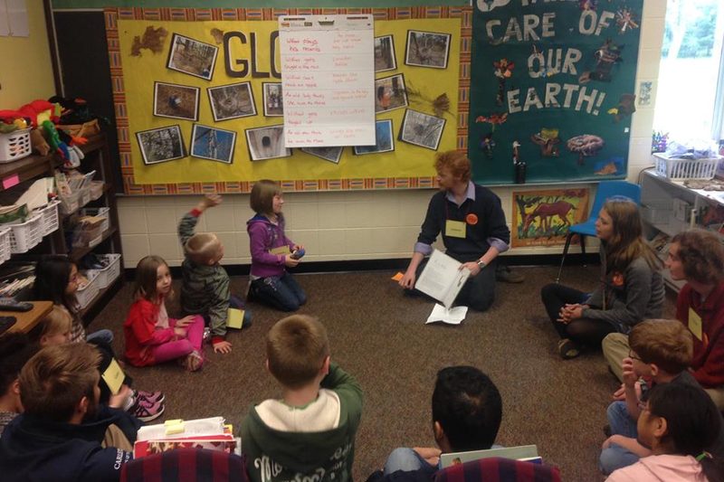 Nick Lorenz with children in a first grade classroom