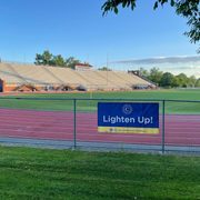 Laird Stadium at Carleton College with Lighten Up! Sign