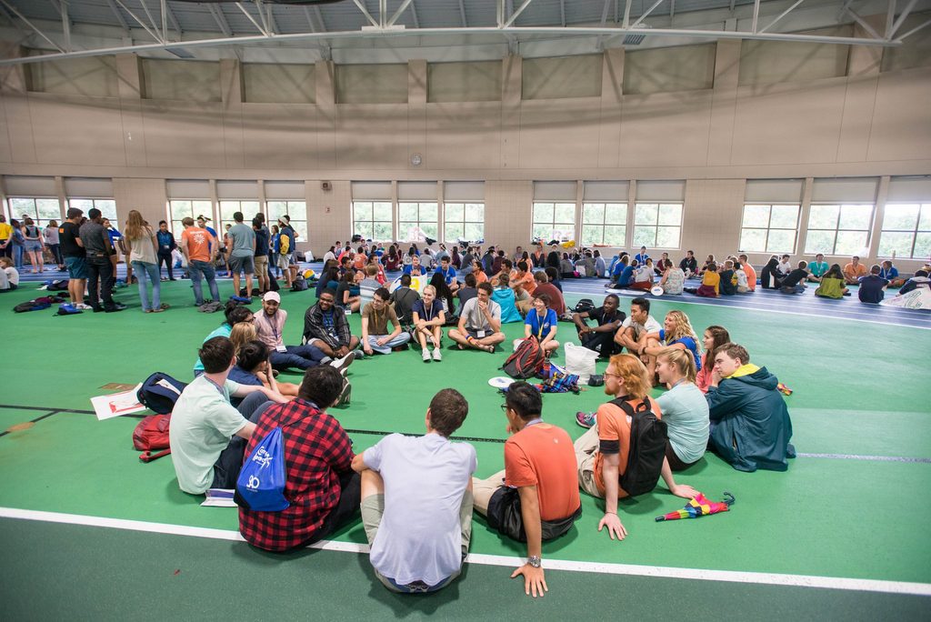 Students sitting in a circle at the Rec