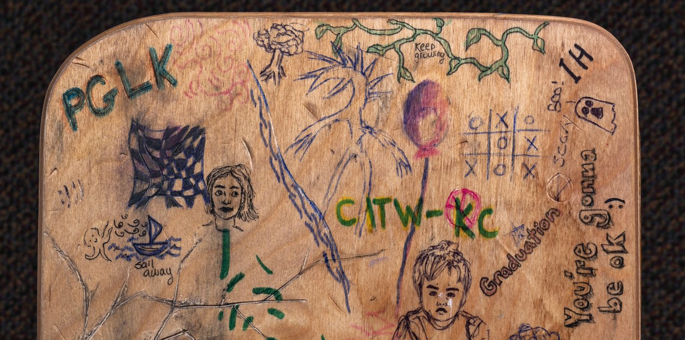Boliou desk with graffiti