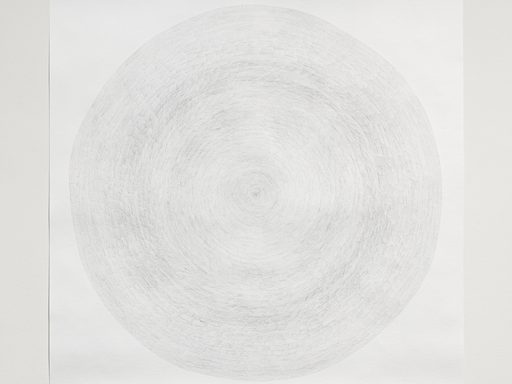 A pencil drawing of a circle made up of small delicately shaded strokes on a white background.