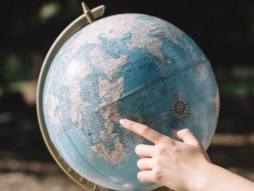 Globe with Finger