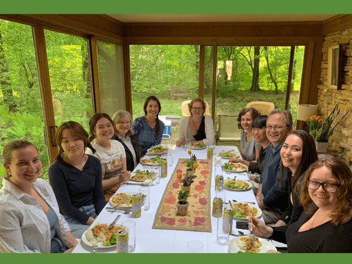 OCS staff eating on a screened porch