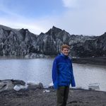 Student in Icelandic Mountains, Raven Dawson '22 at the Glacier Sólheimajökull