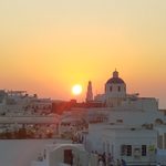 sunset over greek city