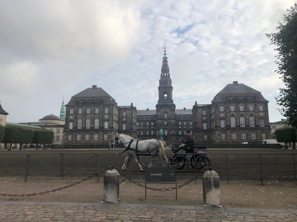 christiansborg with a horse drawn carriage in front