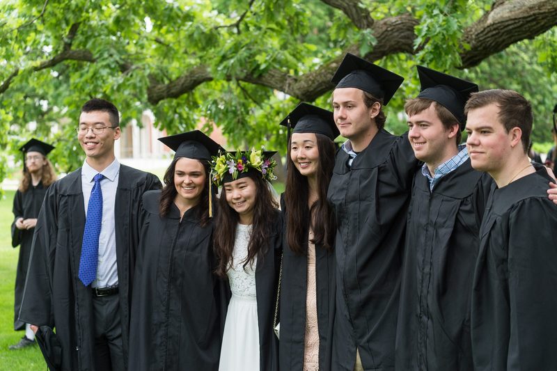 Graduates posing for a picture at Commencement 2022