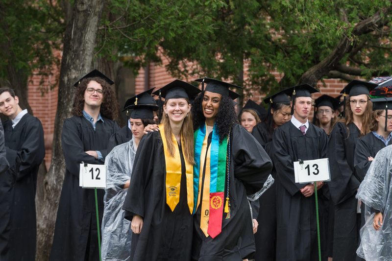 Graduates posing for a picture at Commencement 2022
