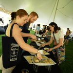 Members of the Class of 2022 enjoy appetizers under the tent