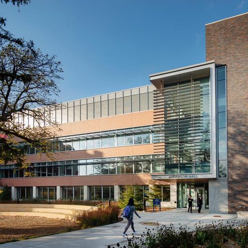 Students walking by Anderson Hall, Carleton's new integrated science center.